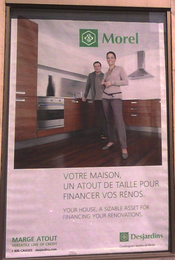 Caisse populaire Desjardins - affiche rue Peel au sud de Ste-Catherine Une bonne pratique pour attirer une clientèle non-traditionelle